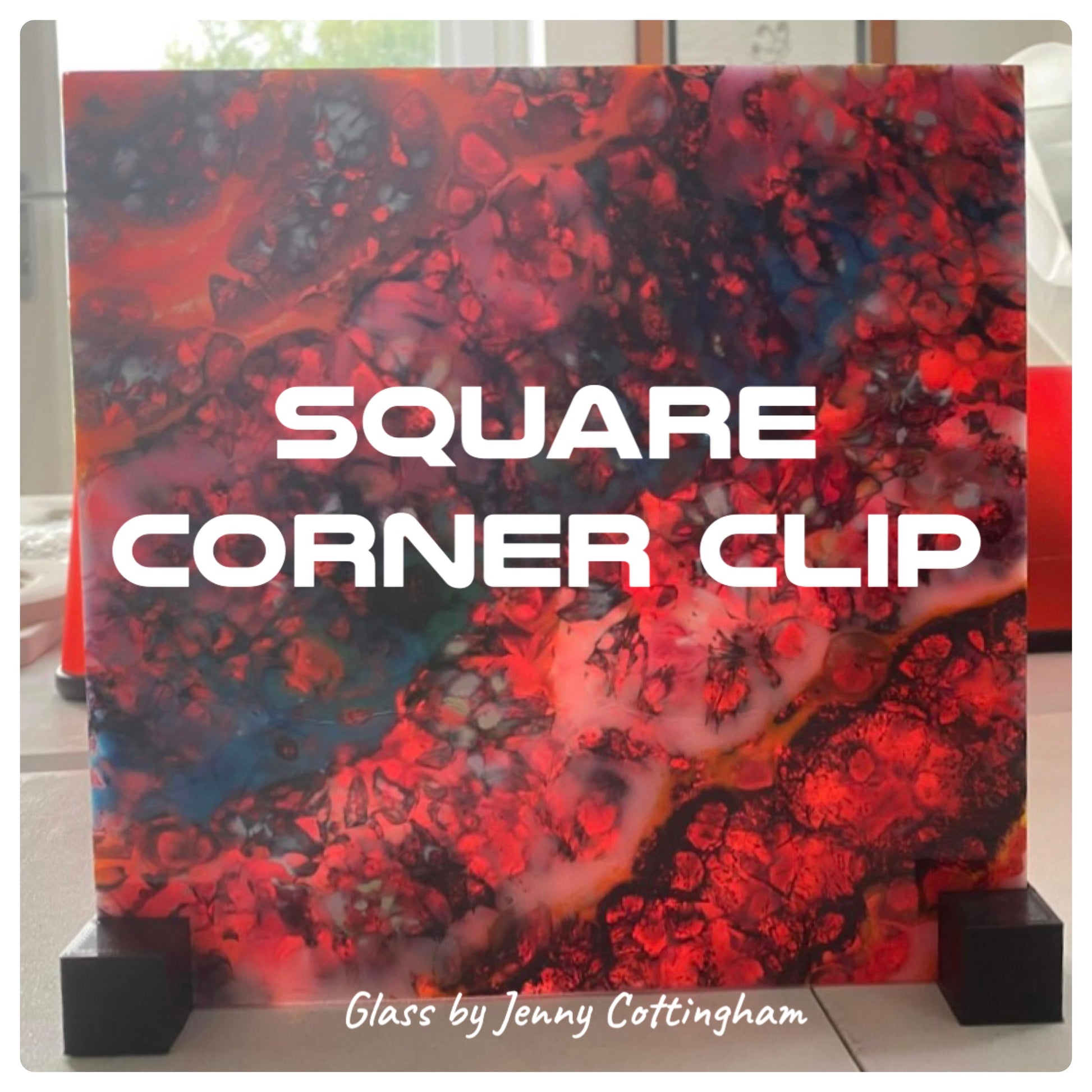 Square corner clips on glass